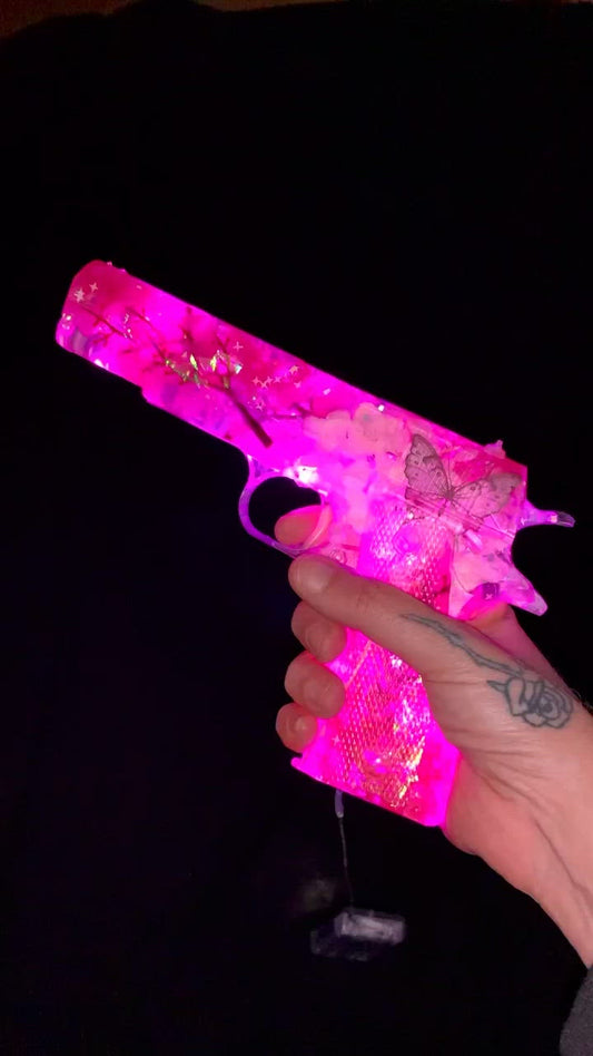 Custom pink resin gun lamp with flowers and glitter