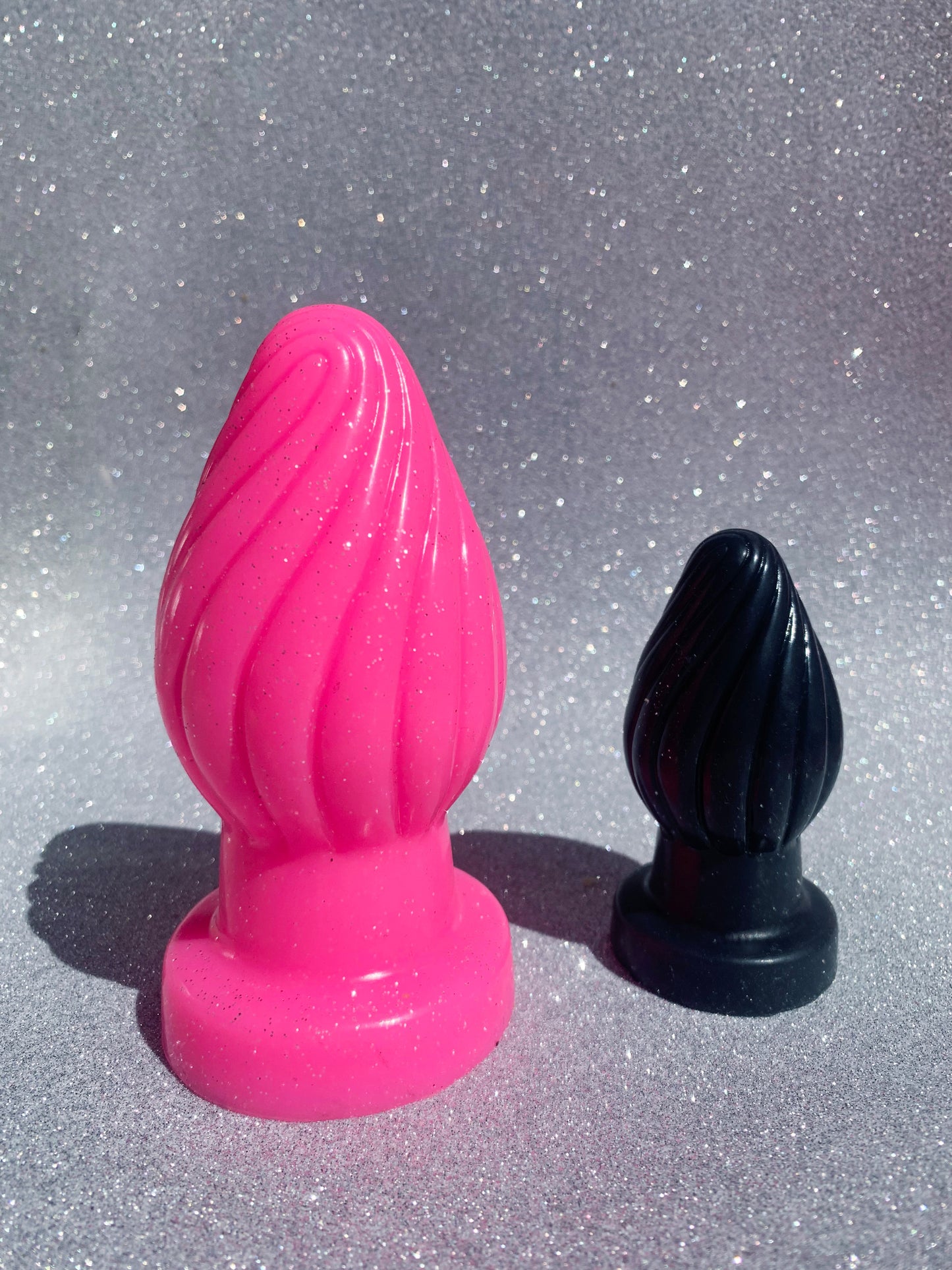 Big pink and black fantasy silicone butt plugs