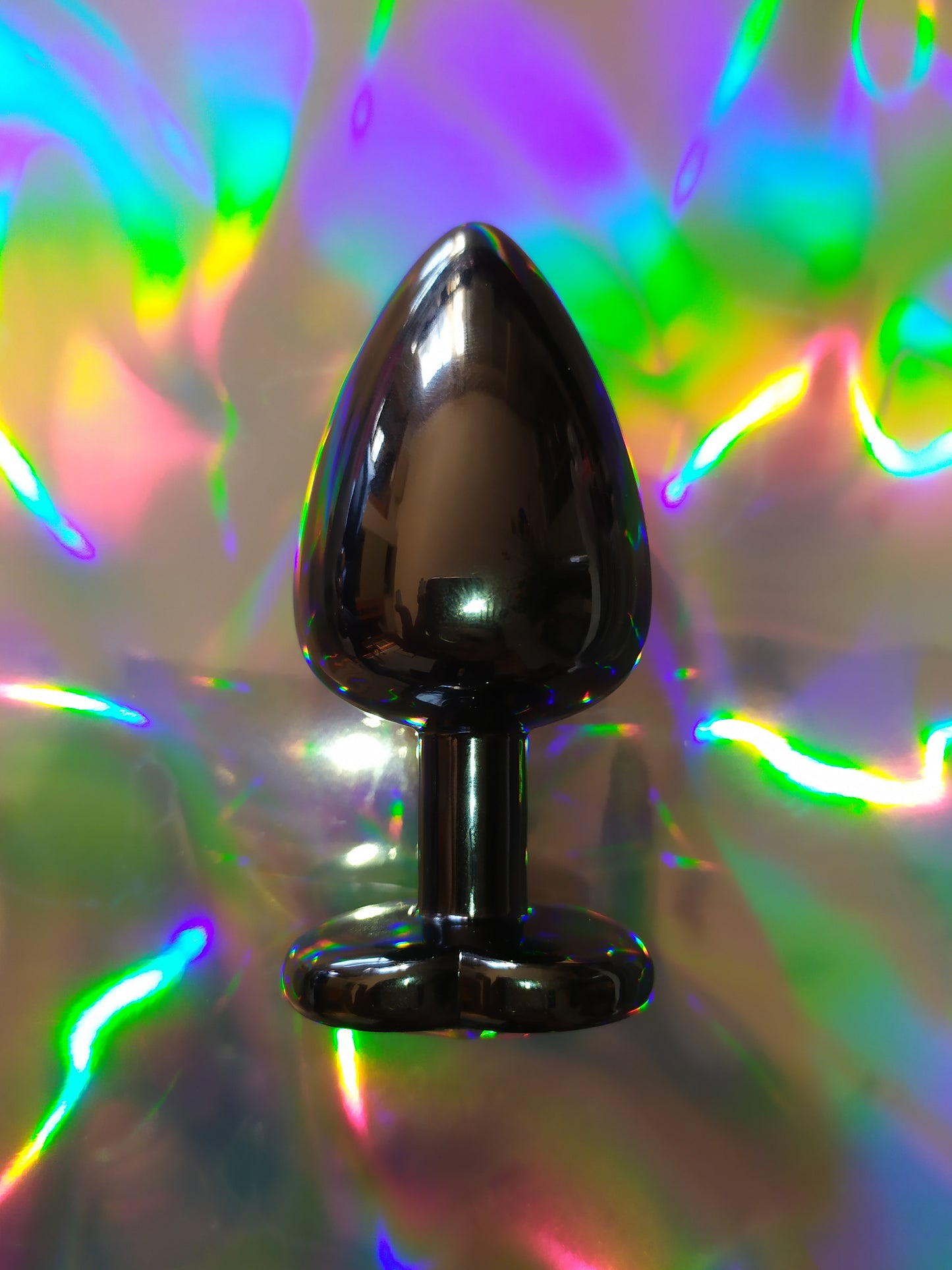 Heart shaped pink jewel butt plug. Black or silver stainless steel butt plug.