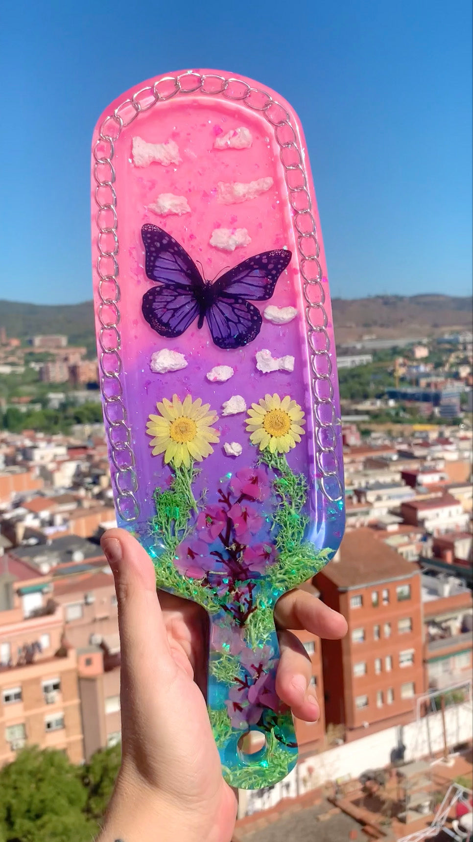 Nature inspired pink resin spanking paddle with butterfly, clouds and flowers