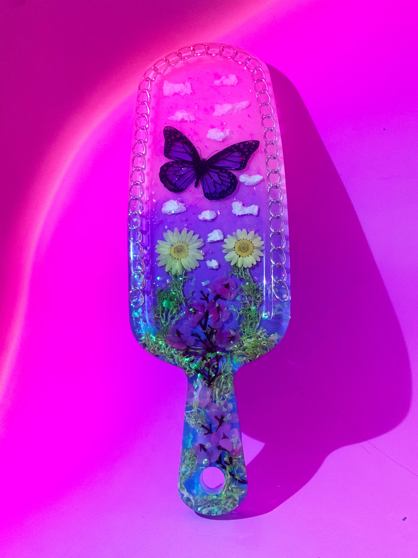 Nature inspired pink resin spanking paddle with butterfly, clouds and flowers