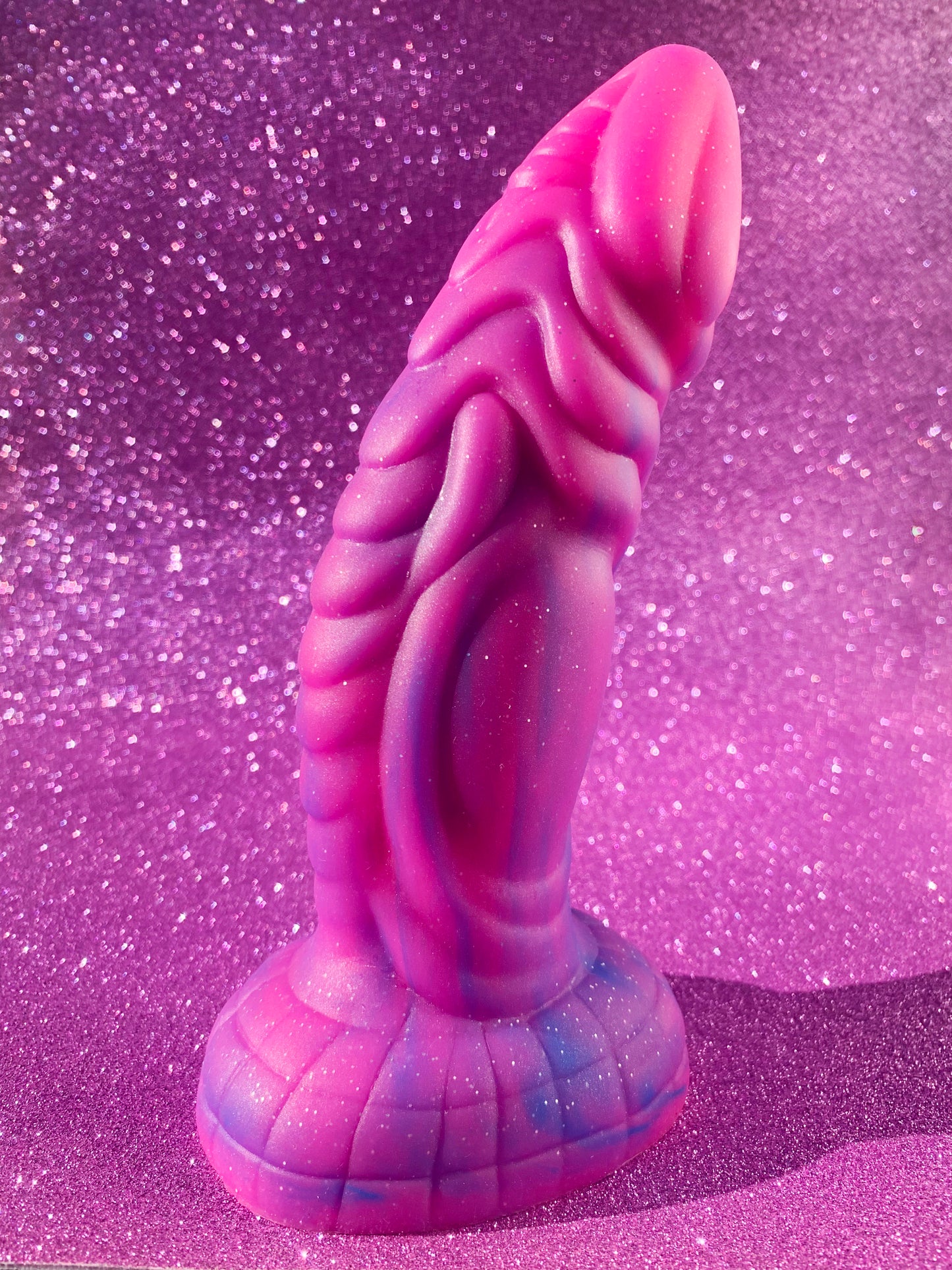 Pink glitter fantasy dildo with strong suction cup made of silicone
