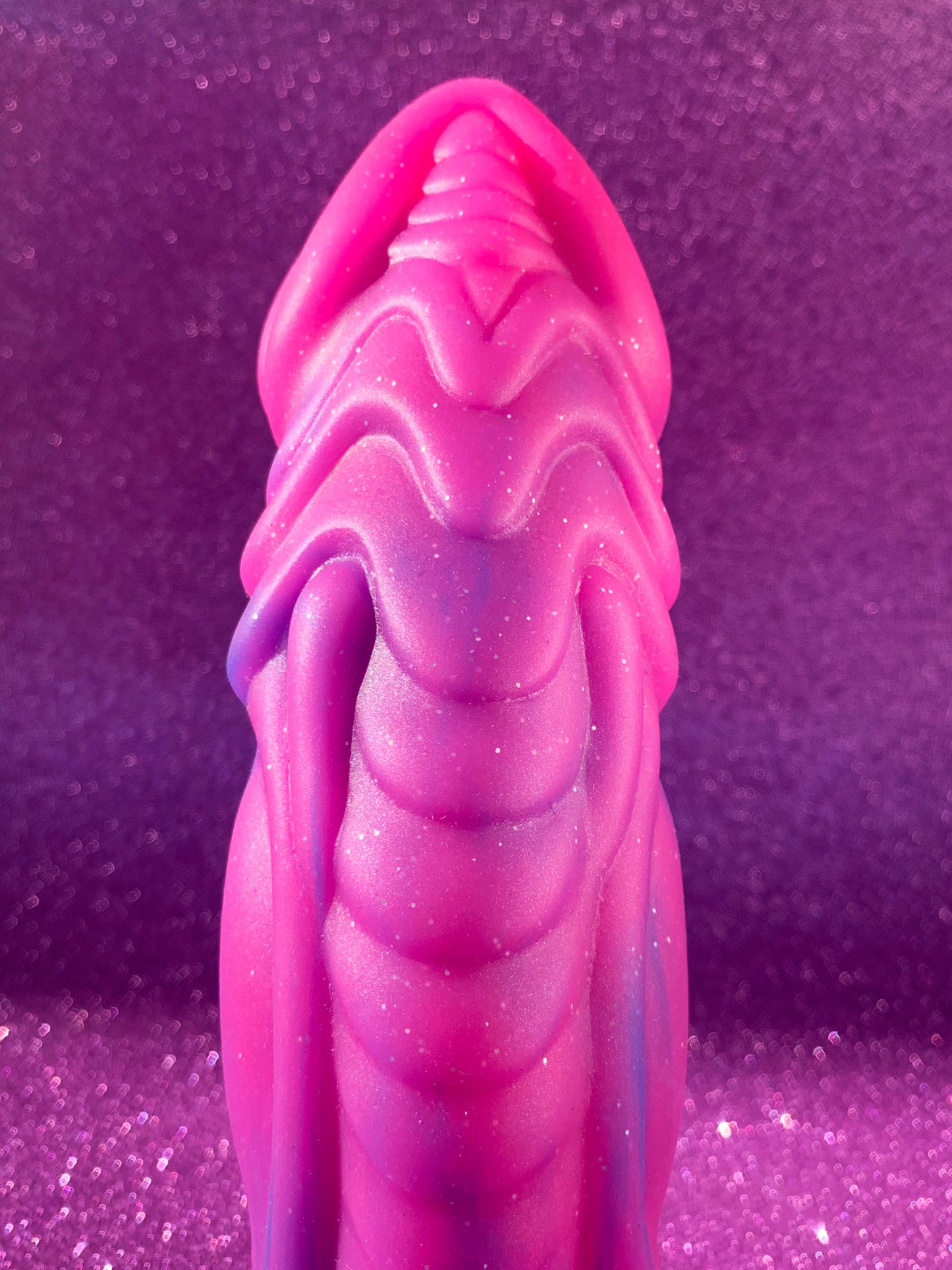 Pink glitter fantasy dildo with strong suction cup made of silicone