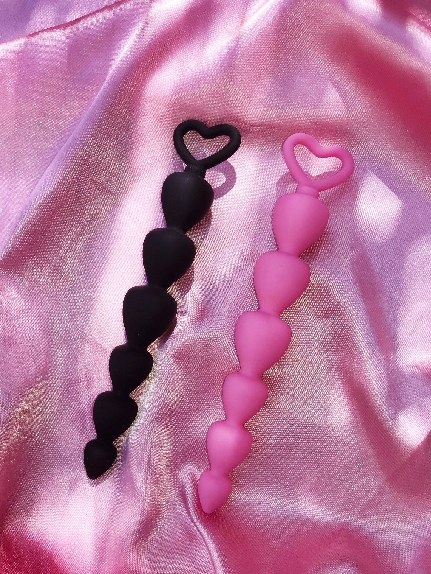 Pink or black small heart shaped silicone butt plugs
