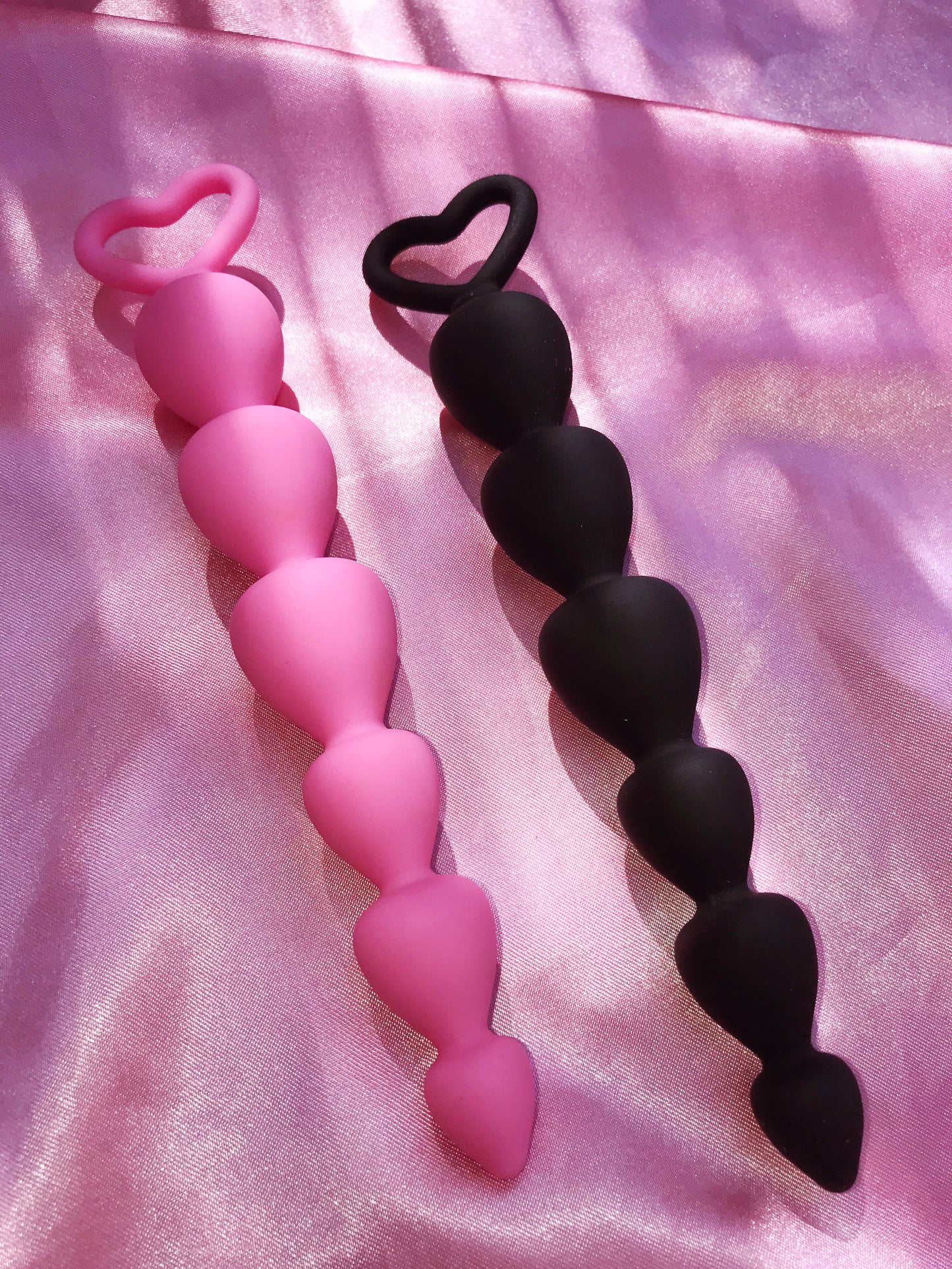 Pink or black small heart shaped silicone butt plugs