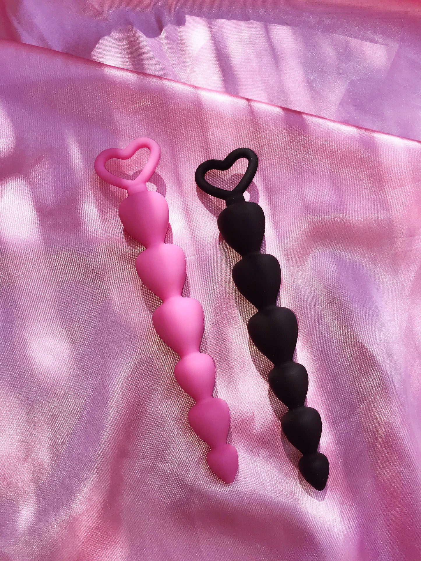 Pink or black small heart shaped silicone butt plugs