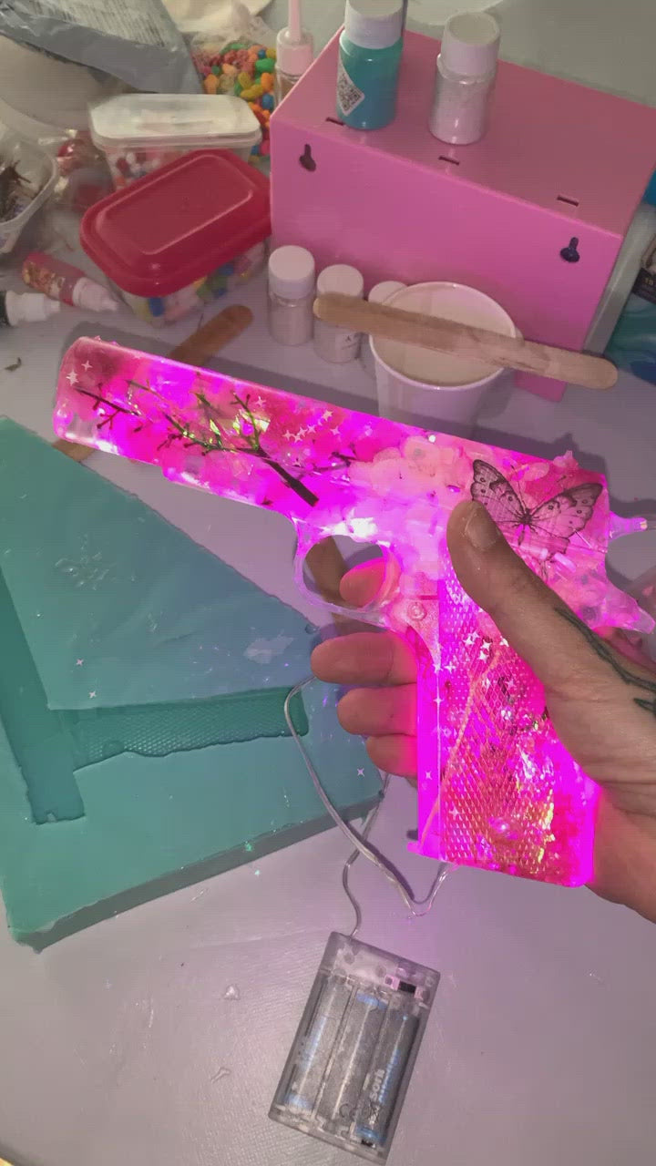 Custom pink resin gun lamp with flowers and glitter