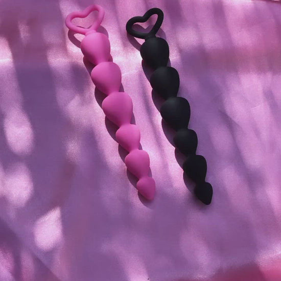 Pink or black small heart shaped silicone butt plugs