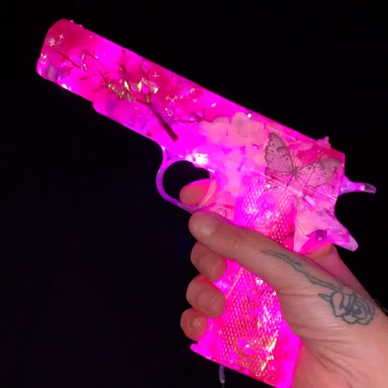 Custom pink resin gun lamp with flowers and glitter