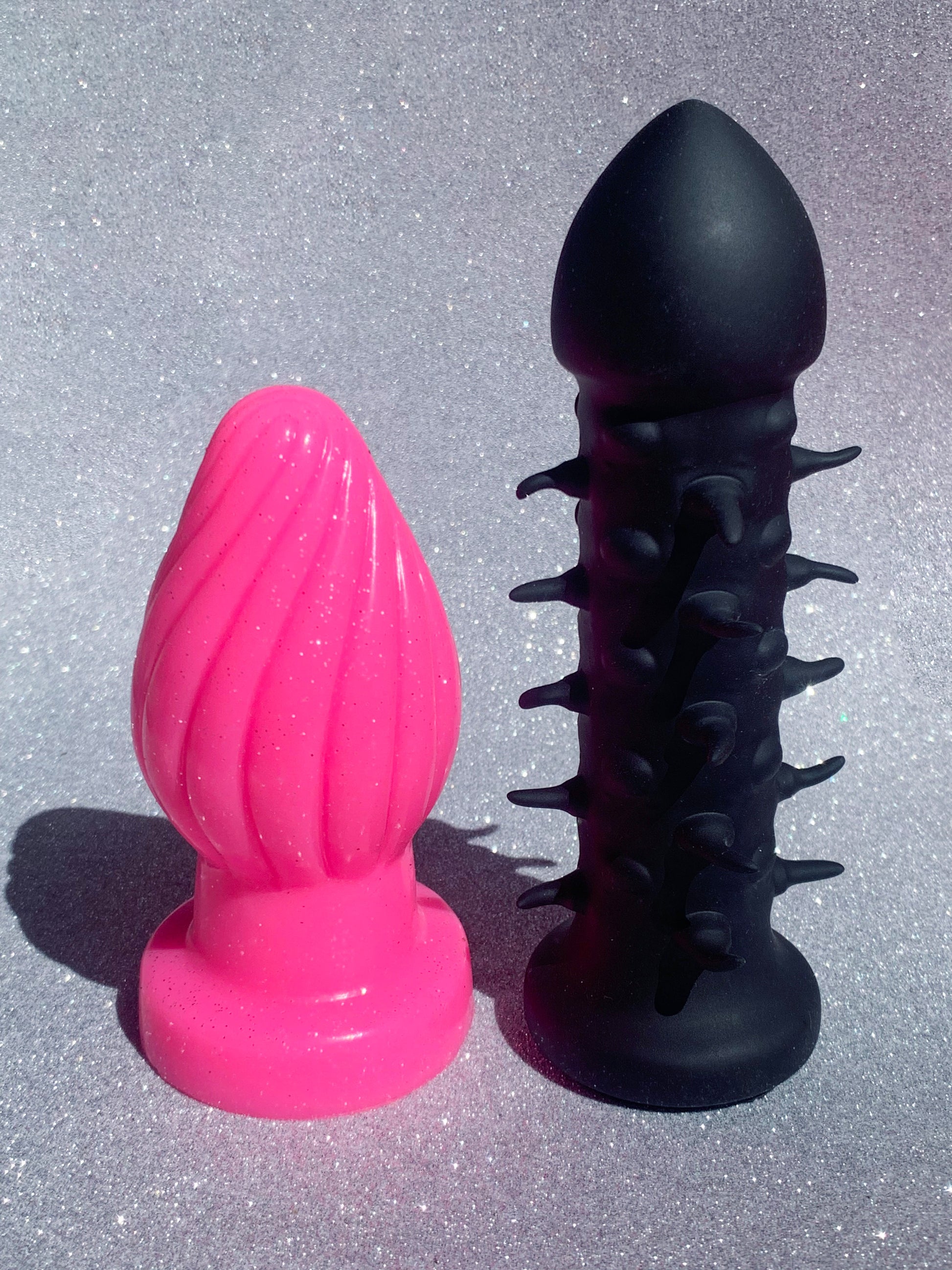 Black spiked BDSM dildo & big fantasy pink butt plug