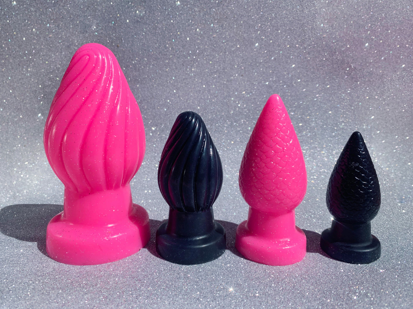 Big pink and black fantasy silicone butt plugs 