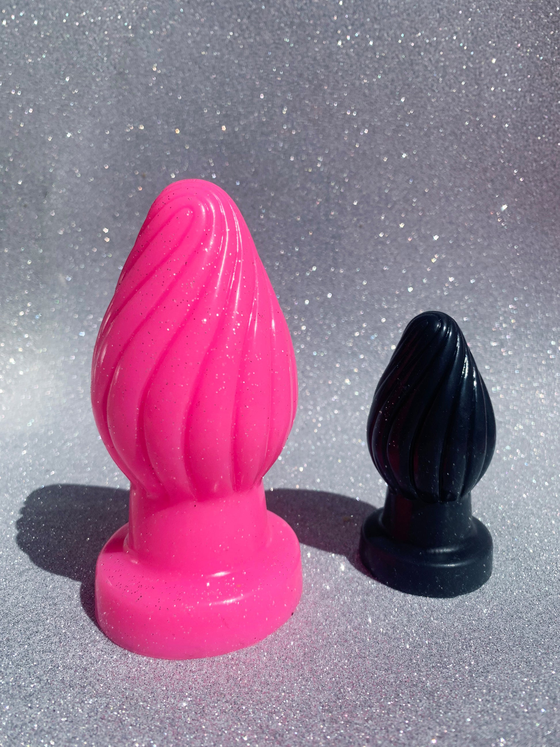 Big pink and black fantasy silicone butt plugs 