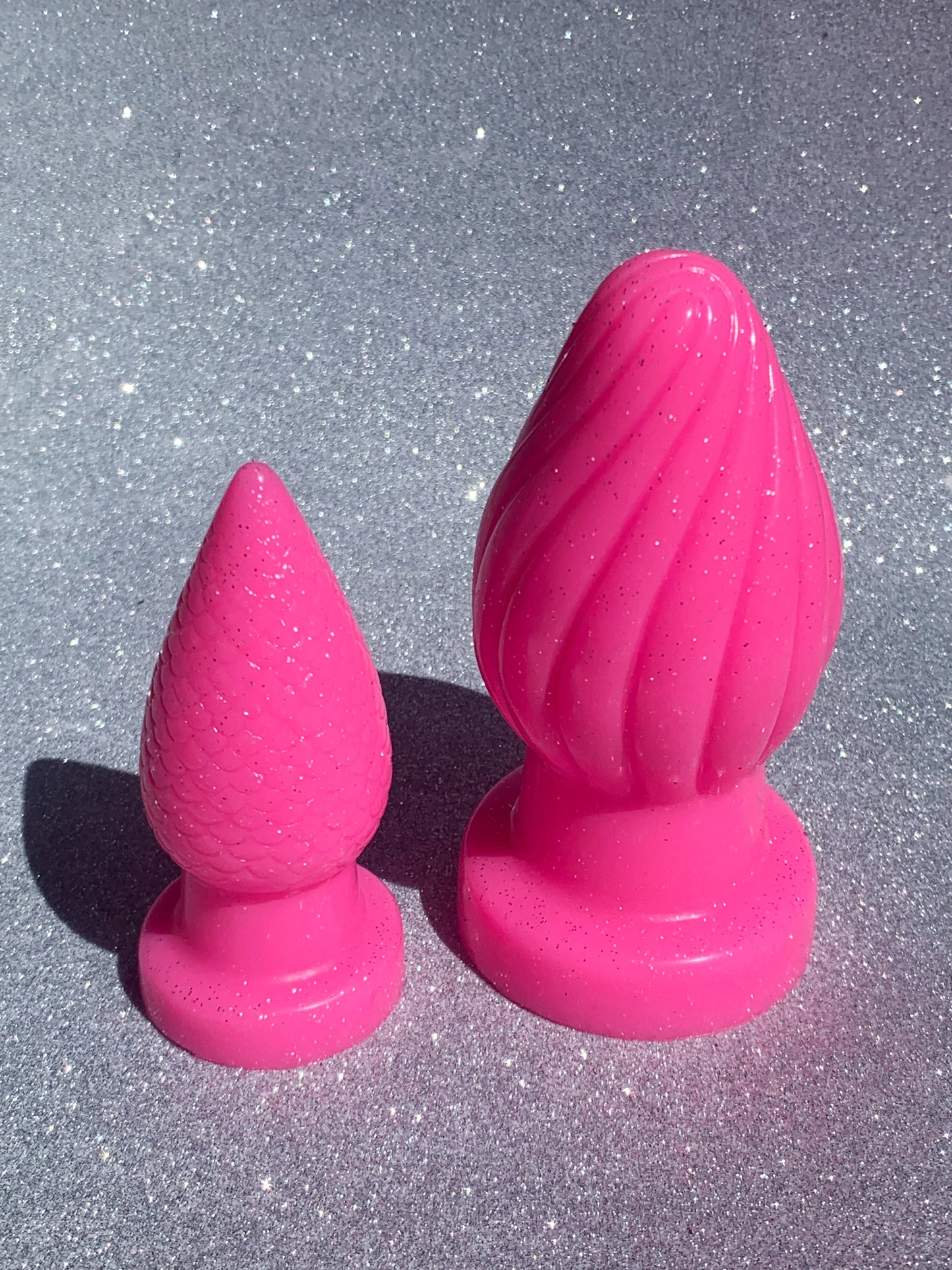 Big pink fantasy silicone butt plugs with glitter