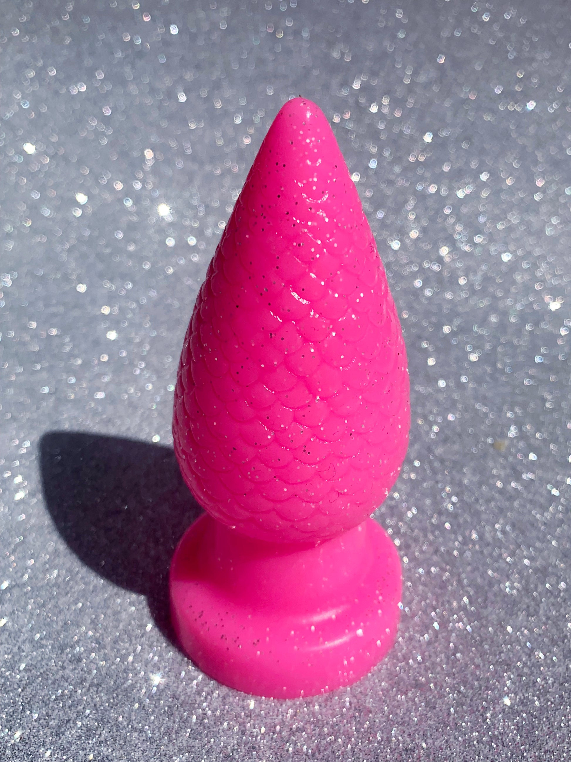 Big pink fantasy silicone butt plug with glitter