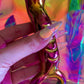 Holographic rainbow glass dildo