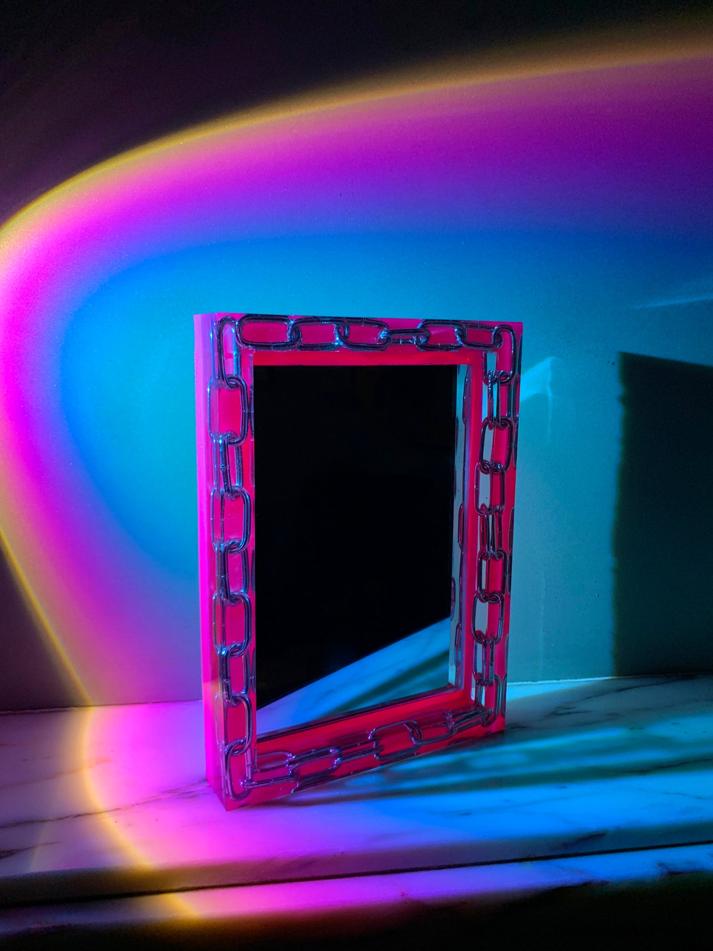 Pink resin selfie mirror with chain