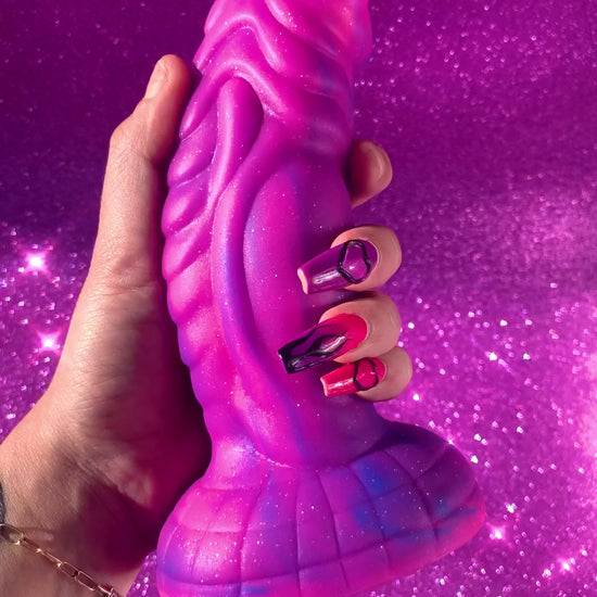 Pink glitter fantasy dildo with strong suction cup made of silicone