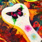 Heart shaped resin spanking paddle made of resin, flowers, butterflies and glitter