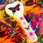 Heart shaped resin spanking paddle made of resin, flowers, butterflies and glitter