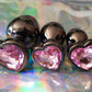 Heart shaped pink jewel butt plug. Black or silver stainless steel butt plug. 