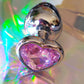 Heart shaped pink jewel butt plug. Black or silver stainless steel butt plug. 
