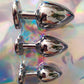 Heart shaped pink jewel butt plug. Black or silver stainless steel butt plug. 