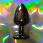 Heart shaped pink jewel butt plug. Black or silver stainless steel butt plug. 