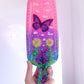 Nature inspired pink resin spanking paddle with butterfly, clouds and flowers 