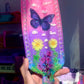 Nature inspired pink resin spanking paddle with butterfly, clouds and flowers 