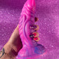 Pink glitter fantasy dildo with strong suction cup made of silicone