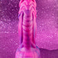Pink glitter fantasy dildo with strong suction cup made of silicone