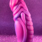 Pink glitter fantasy dildo with strong suction cup made of silicone