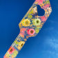 Resin spanking paddle with dried flowers, gold flakes and glitter holographic paper