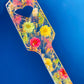 Resin spanking paddle with dried flowers, gold flakes and glitter holographic paper