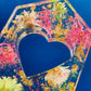Resin spanking paddle with dried flowers, gold flakes and glitter holographic paper