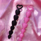 Pink or black small heart shaped silicone butt plugs