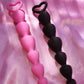 Pink or black small heart shaped silicone butt plugs